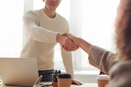 employees shaking hands